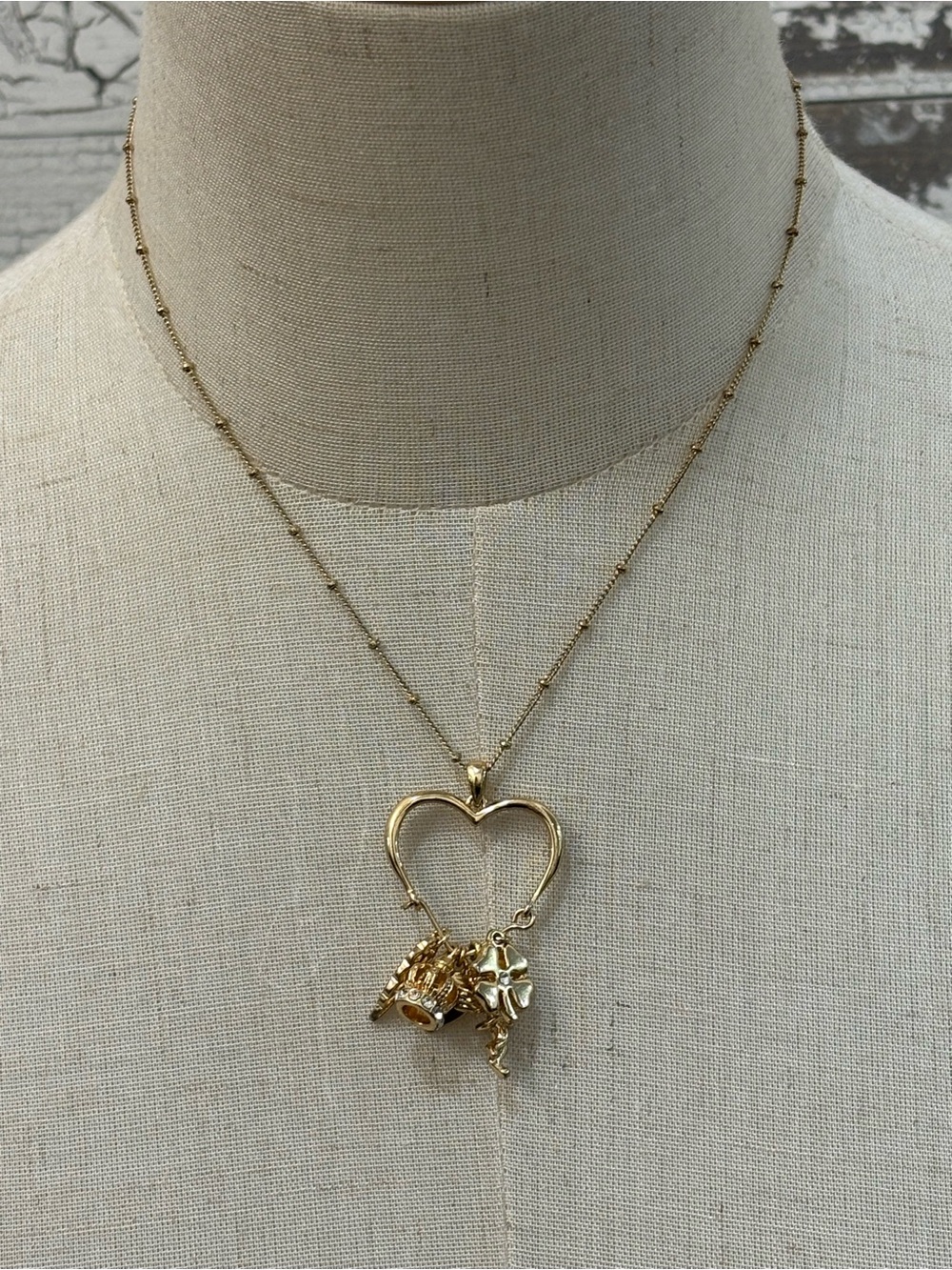 Gold Heart Charm Necklace with Multiple Charms
